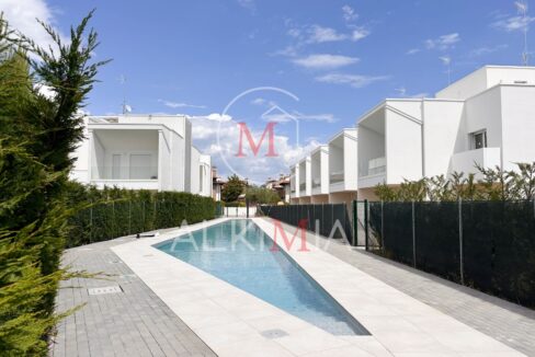 Lignano villa con piscina comune