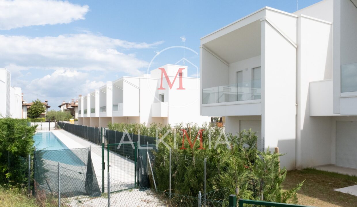 Lignano villa con piscina comune esterno 2